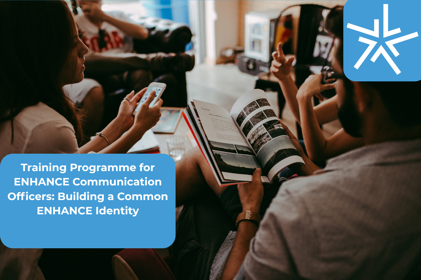 People sitting together and talking; a woman holding a smartphone, a man reading a newspaper. Friendly and professional atmosphere. Add ENHANCE logo and title text.