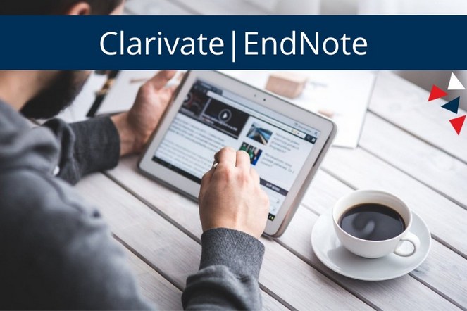 mężczyzna pracujący na tablecie