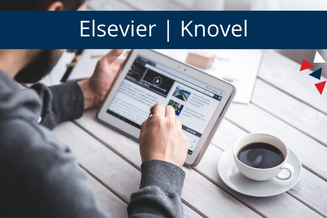 meżczyzna pracujący na tablecie