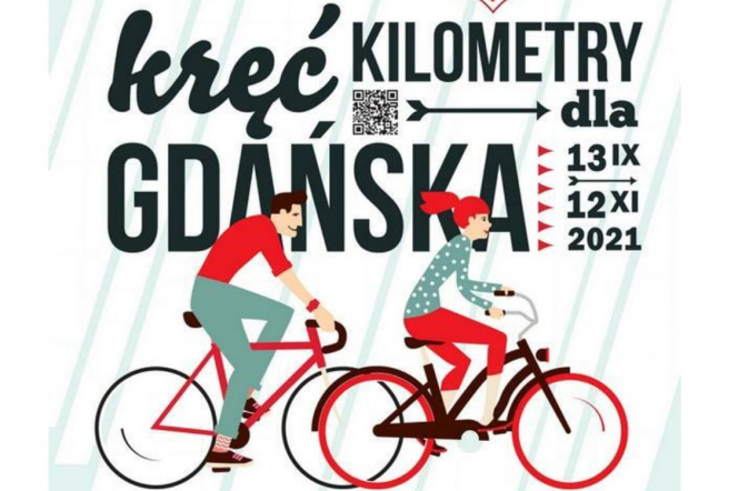 Osoba na rowerze i napis Kręć kilometry 