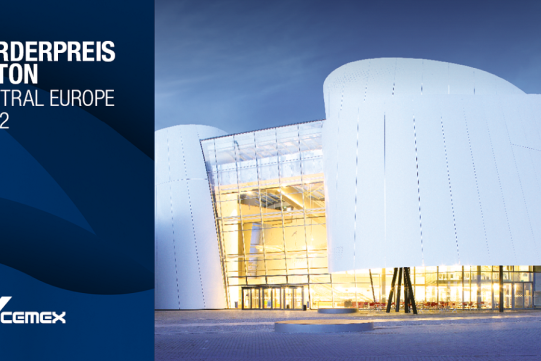 Na zdjęciu na niebieskim tle po prawej stronie jest widoczna budowla, po lewej informacja o konkursie.