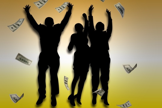 3 standing black figures and falling banknotes.