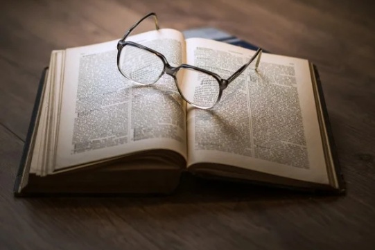 glasses on a book