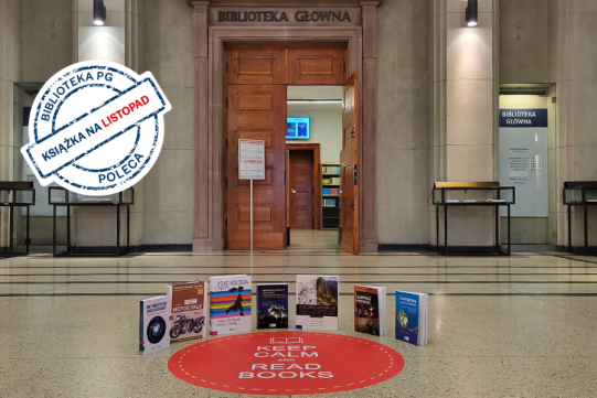 książki ułożone w półokręgu na ziemi w holu przed głównym wejściem do Biblioteki Politechniki Gdańskiej