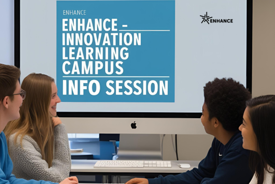 students are sitting in the fron of a big screen