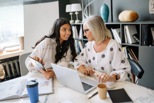 women talking in the office