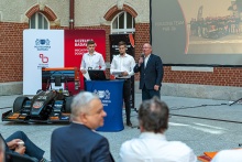 Presentation of the PGRacing Team car. Prof. Krzysztof Wilde, rector of Gdańsk Tech. Dawid Ossowski (team leader) and Przemysław Kulwas from PGRacing Team are standing at the lectern. Photo: Jacek Klejment / Gdańsk University of Technology 