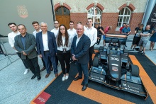 In the picture: prof. Krzysztof Wilde, rector of Gdańsk Tech, prof. Andrzej Seweryn, the Dean of the FMEST, and Bogdan Ścibiorski, PhD, Eng., club supervisor with PGRacing Team leaders. Photo: Jacek Klejment / Gdańsk University of Technology